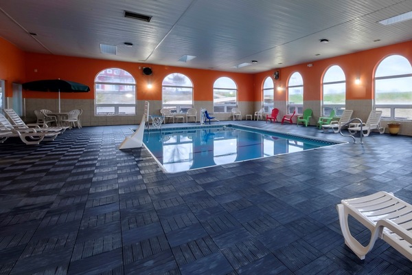 Indoor pool, open 8:00 AM to 11:00 PM, pool umbrellas, sun loungers