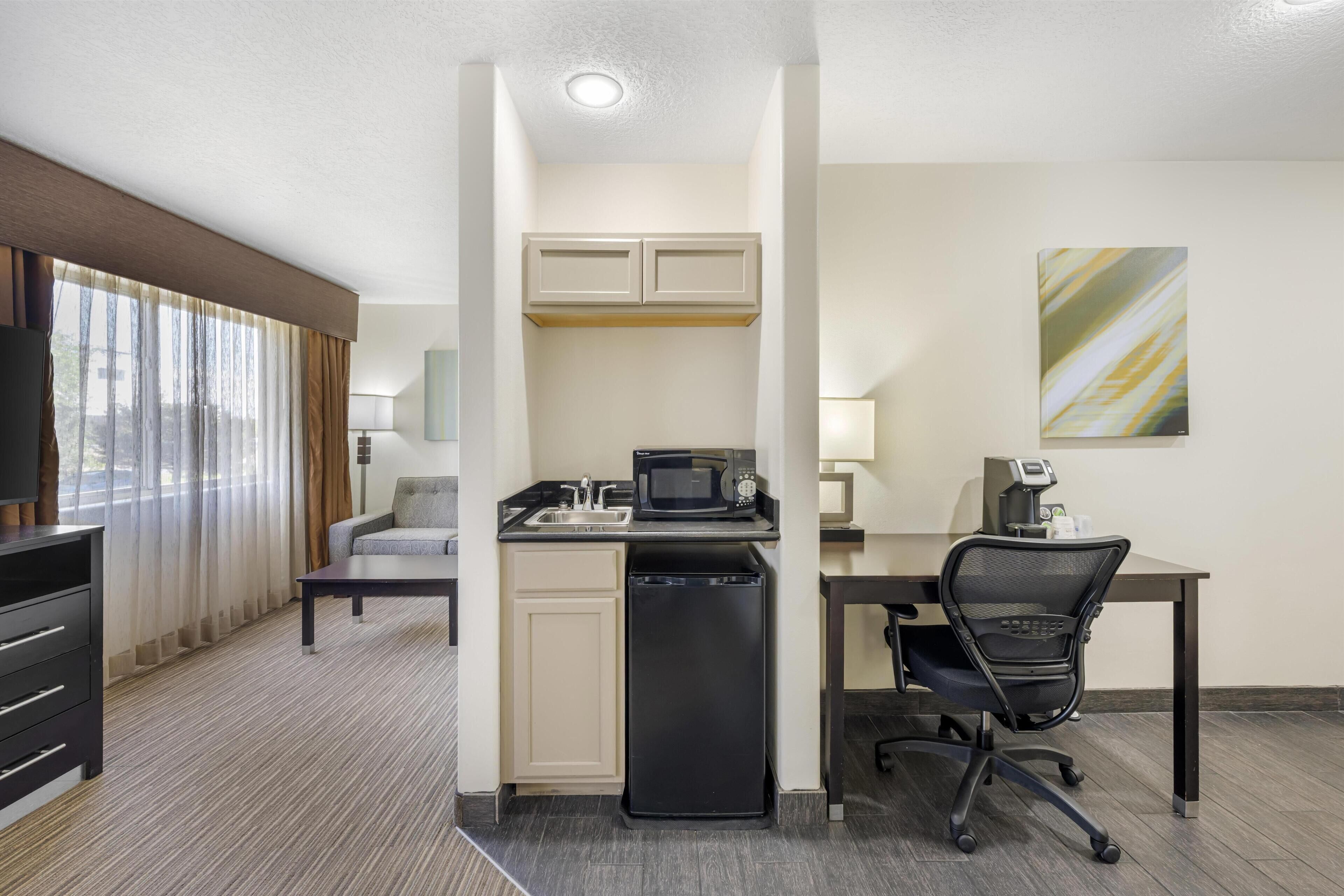 Junior Suite, 1 King Bed, Non Smoking, Refrigerator & Microwave (with Sofabed) | Desk, blackout drapes, iron/ironing board, WiFi (free)