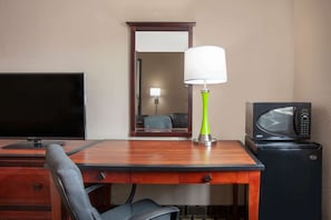 Desk, blackout curtains, iron/ironing board, rollaway beds