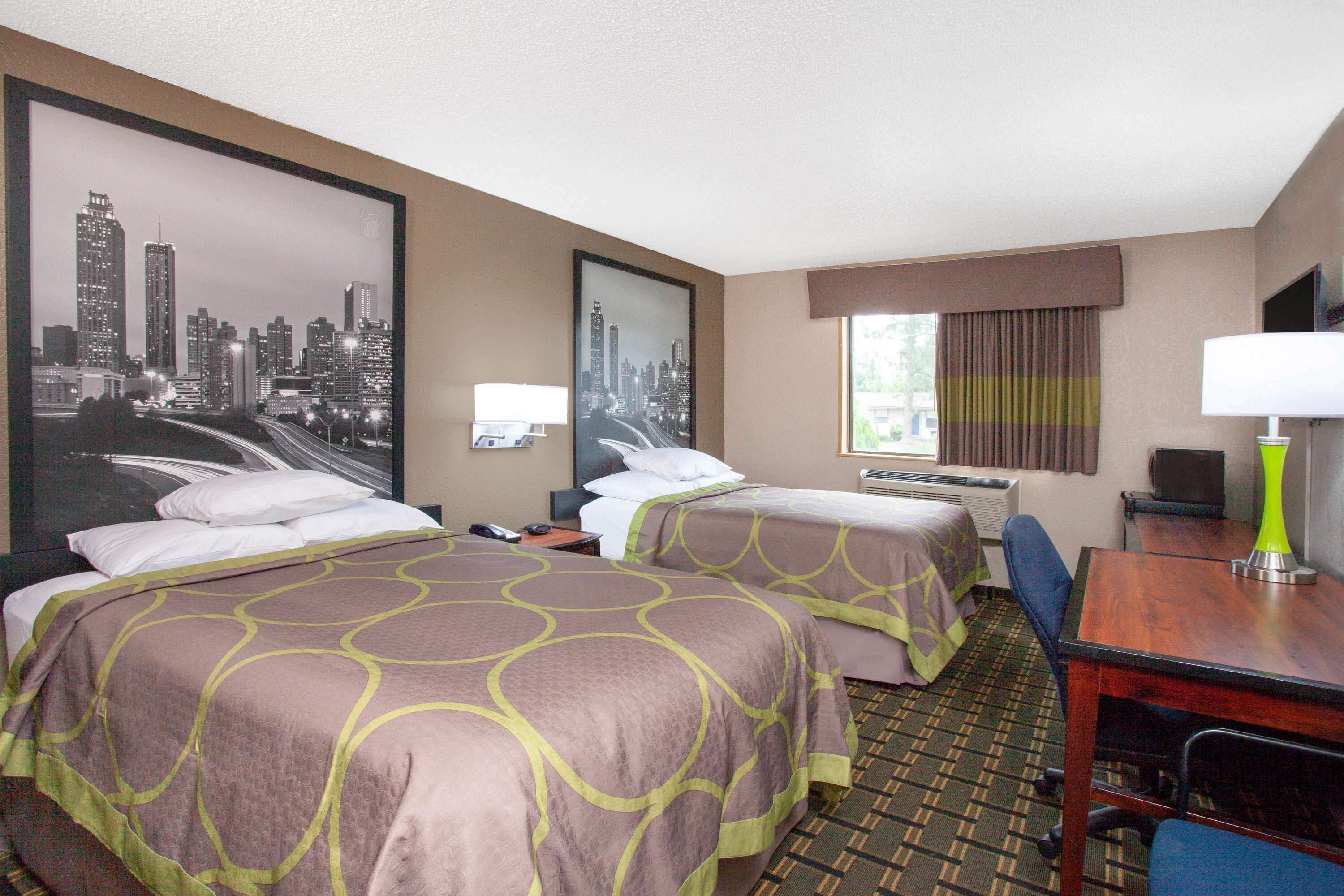 Desk, blackout curtains, iron/ironing board, rollaway beds