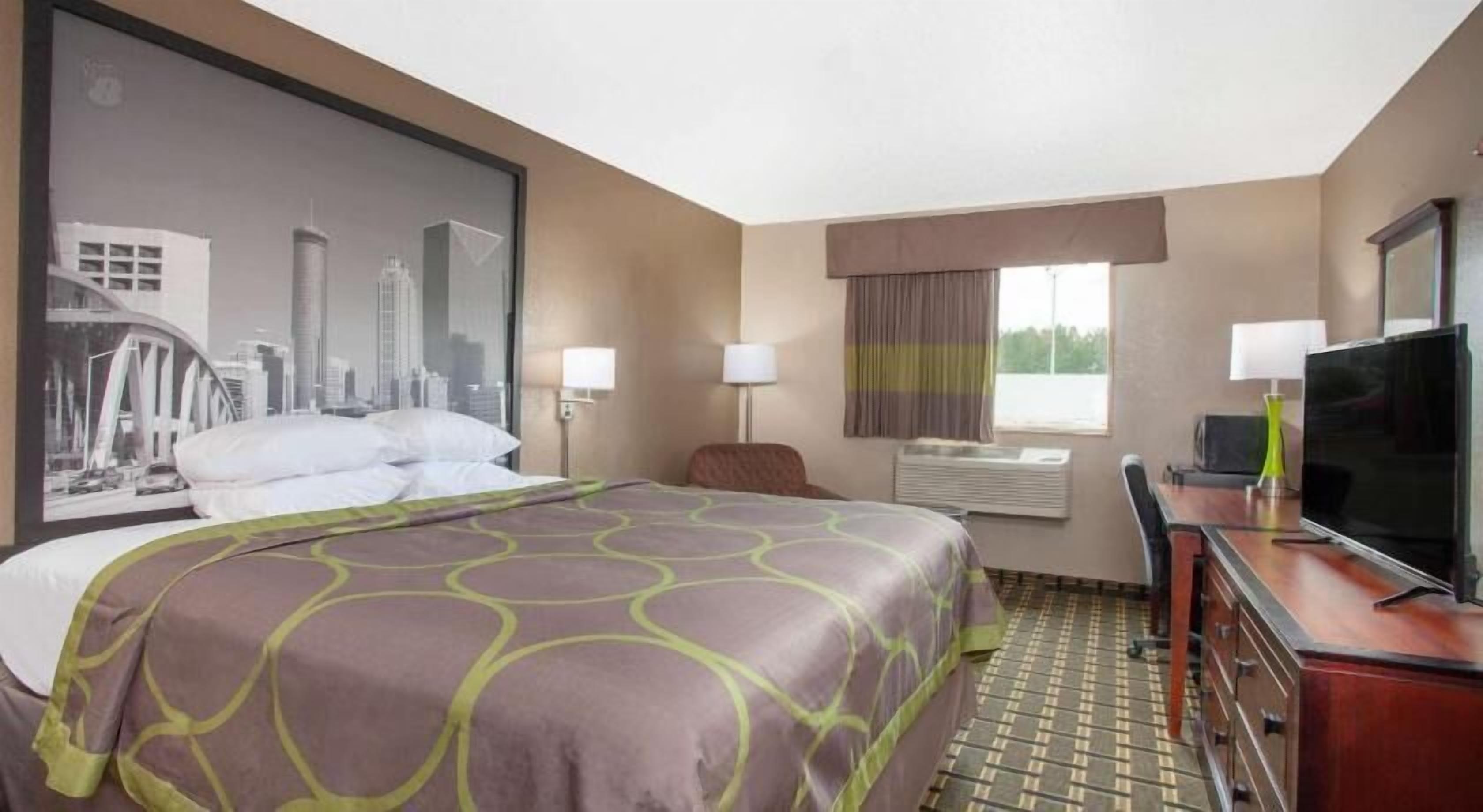 Desk, blackout curtains, iron/ironing board, rollaway beds