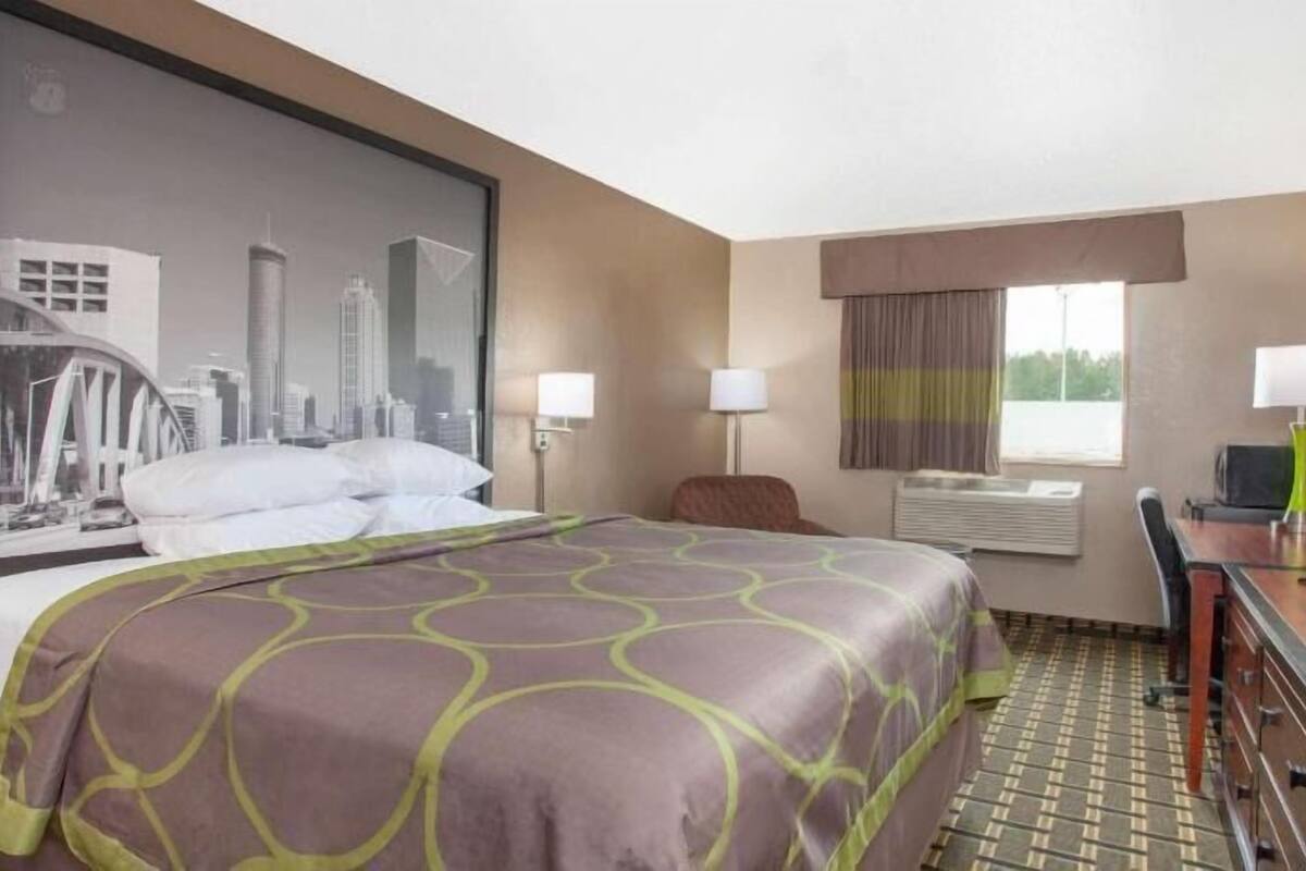 Desk, blackout curtains, iron/ironing board, rollaway beds