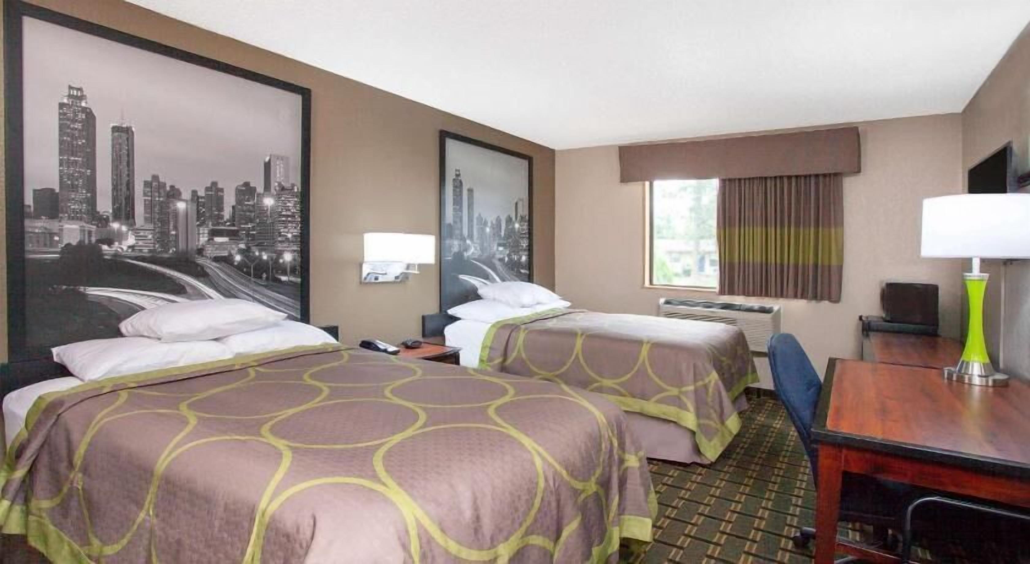 Desk, blackout curtains, iron/ironing board, rollaway beds