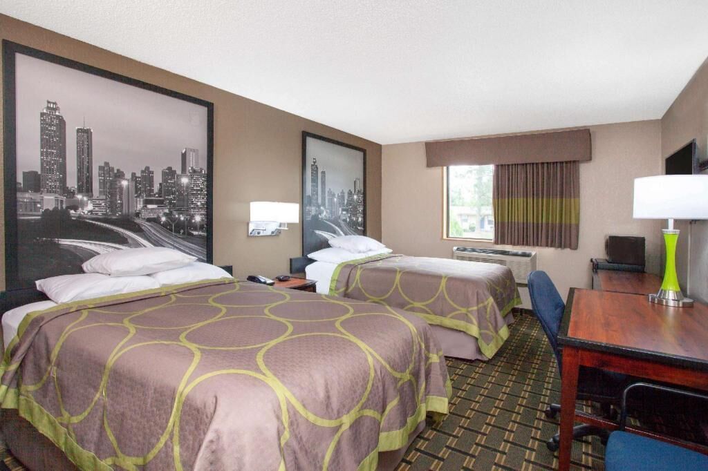 Desk, blackout curtains, iron/ironing board, rollaway beds