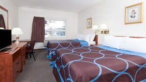 A hotel room with two beds, a desk with a TV, a chair, and a window with curtains. - Super 8 by Wyndham Edmonton/West (Edmonton)