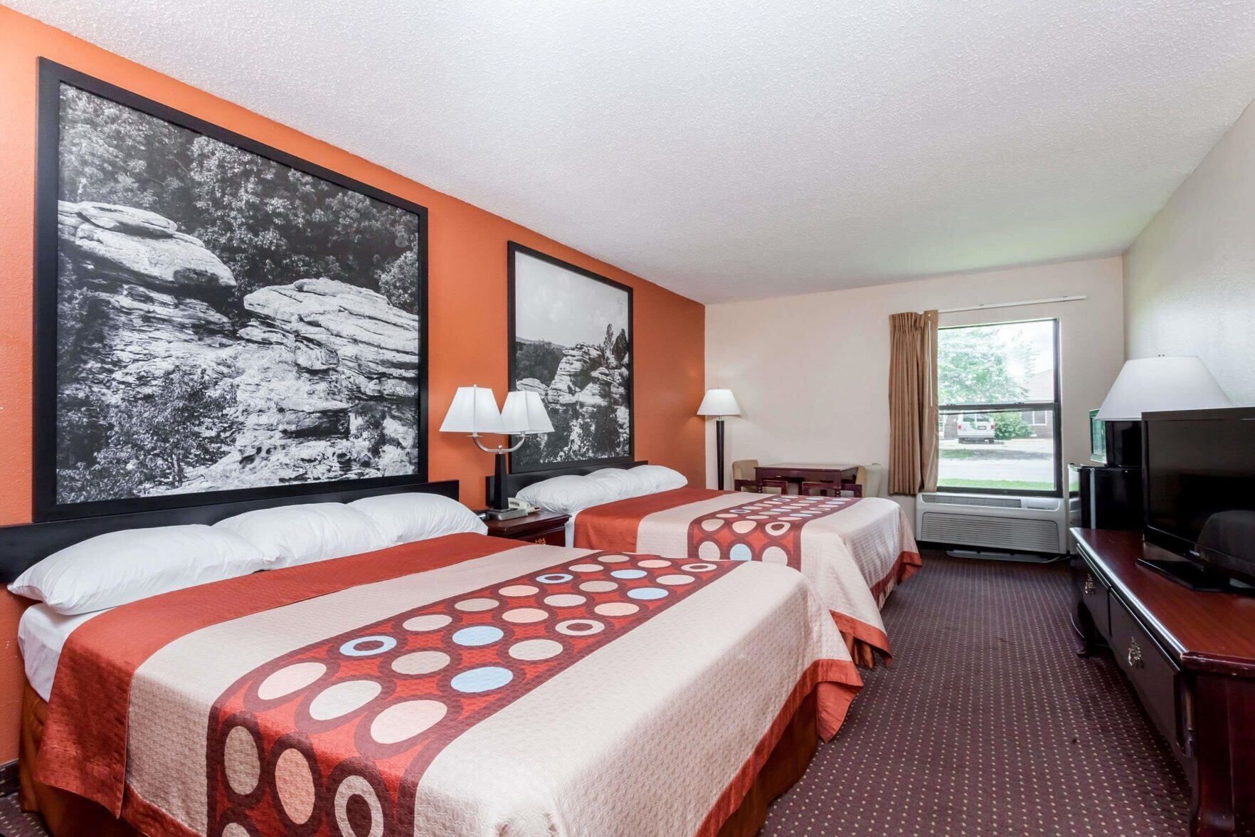 Desk, blackout curtains, iron/ironing board, free cots/infant beds