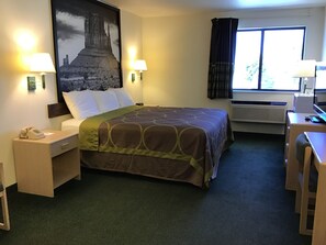 Desk, laptop workspace, iron/ironing board, free cribs/infant beds