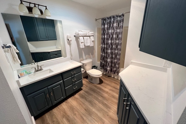 Suite, Non Smoking, Kitchen | Bathroom | Combined shower/tub, hair dryer, towels, soap