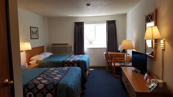 Desk, laptop workspace, blackout curtains, free cots/infant beds