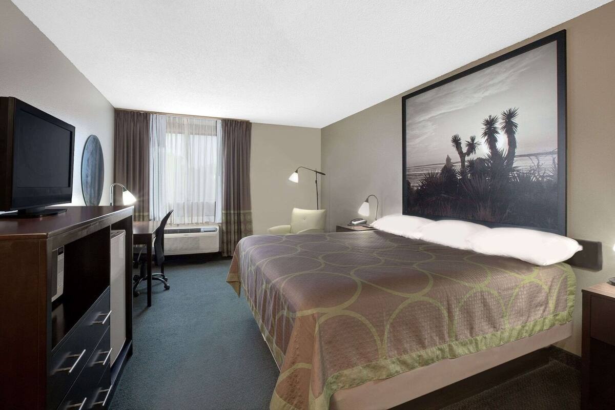 Premium bedding, desk, blackout curtains, iron/ironing board