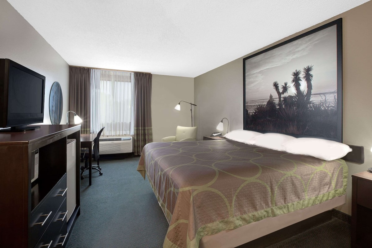 Premium bedding, desk, blackout curtains, iron/ironing board