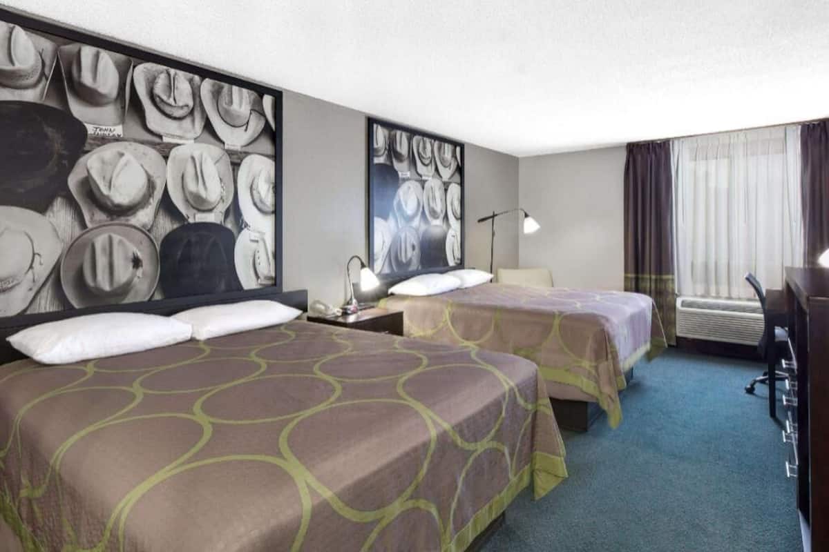 Premium bedding, desk, blackout drapes, iron/ironing board