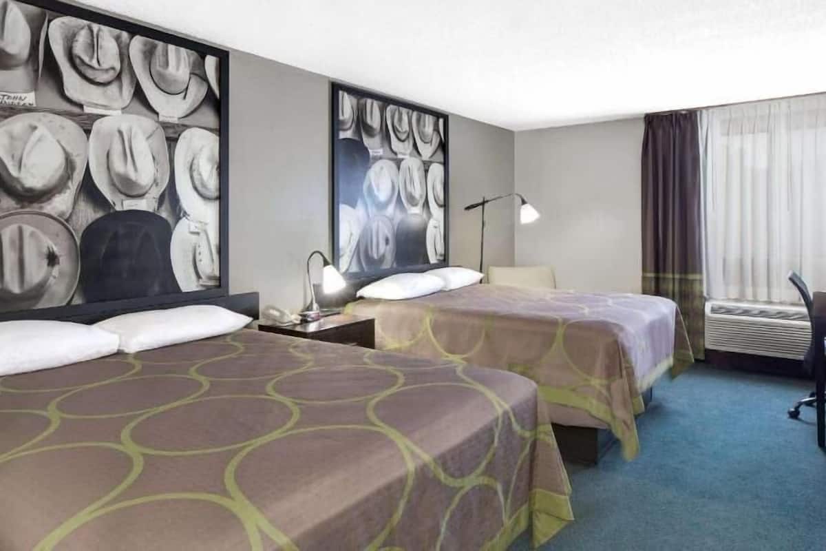 Premium bedding, desk, blackout drapes, iron/ironing board