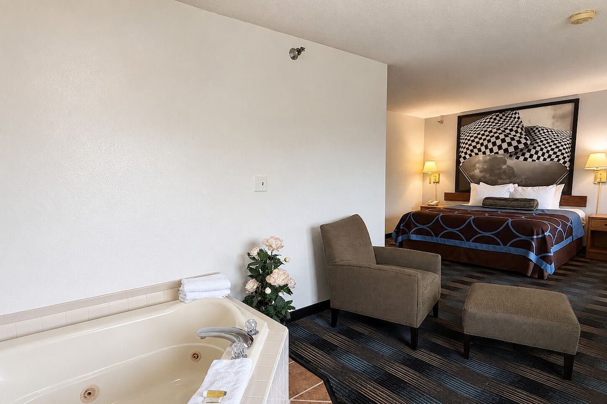 Studio Suite, 1 King Bed, Non Smoking | Desk, laptop workspace, blackout drapes, iron/ironing board