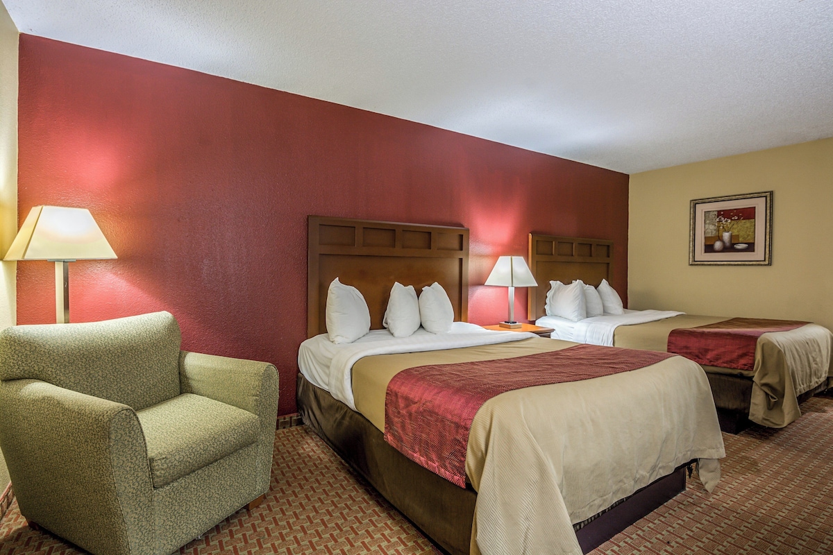 Premium bedding, desk, blackout drapes, soundproofing