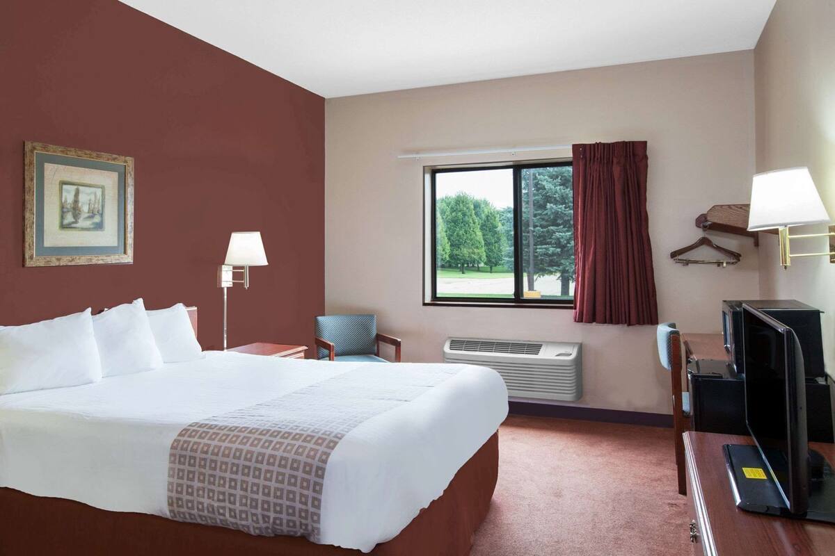 Cortinas blackout, ferros/tábuas de passar roupa, Wi-Fi de cortesia