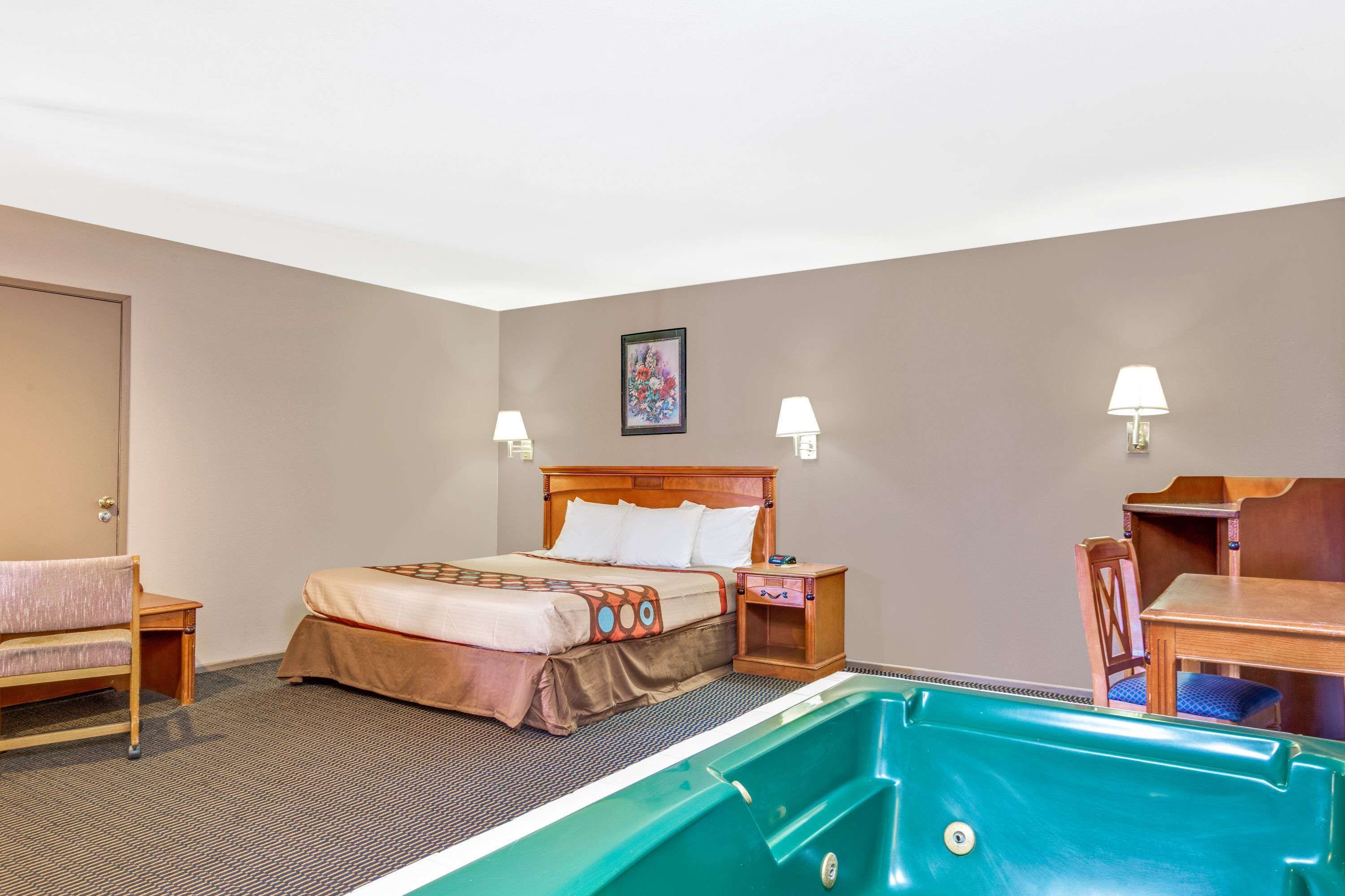 Studio Suite, 1 King Bed, Non Smoking, Jetted Tub | Blackout drapes, iron/ironing board, free cribs/infant beds