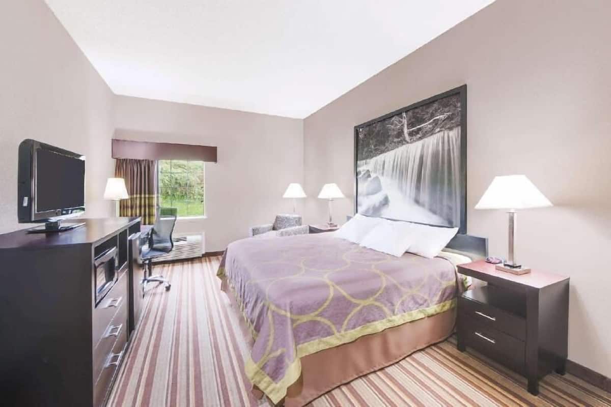 Desk, blackout drapes, iron/ironing board, free cribs/infant beds