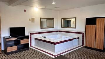 Suite, 1 King Bed, Hot Tub | Desk, free cribs/infant beds, rollaway beds, free WiFi