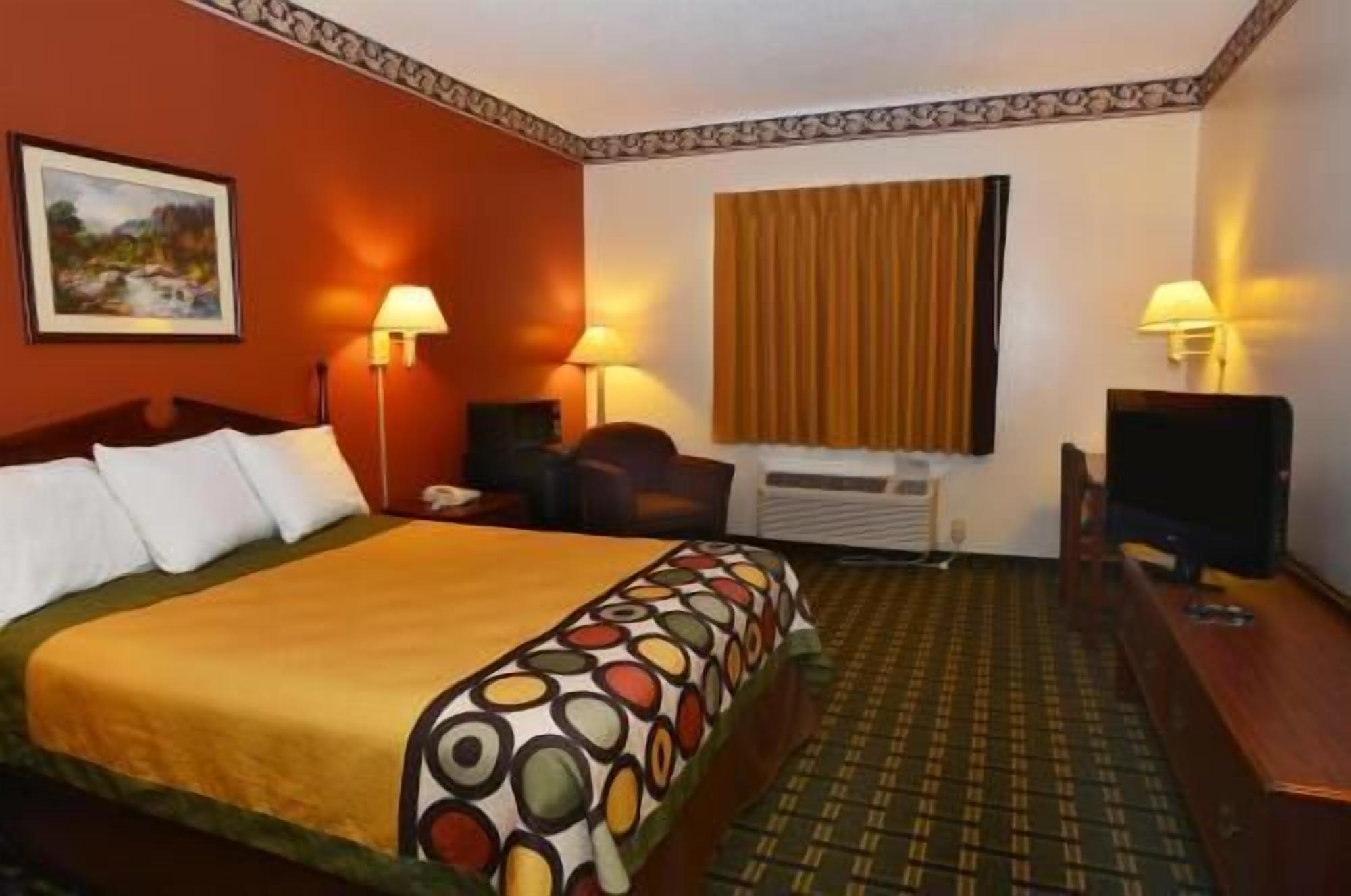 Blackout drapes, iron/ironing board, free cribs/infant beds