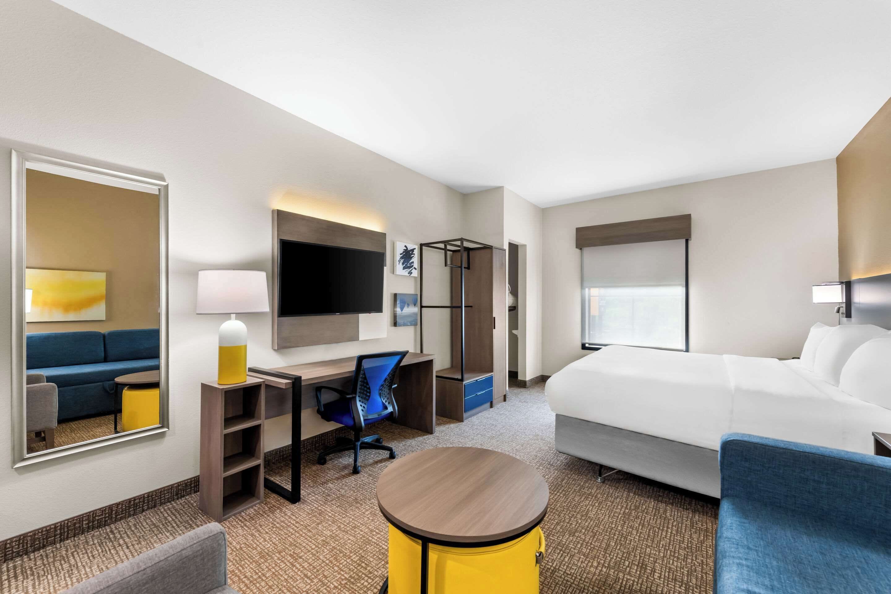 suite, 1 king bed with sofa bed, accessible, non smoking | premium bedding, down duvets, blackout curtains, iron/ironing board