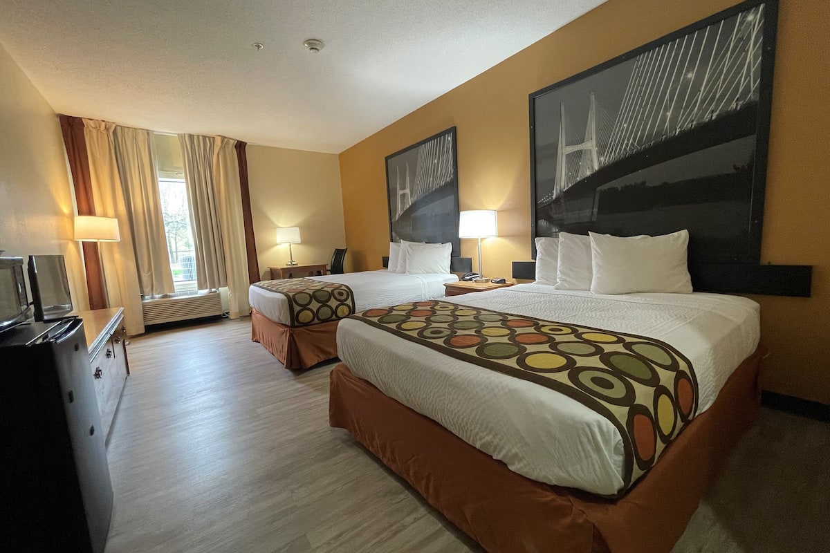 Desk, laptop workspace, blackout drapes, rollaway beds