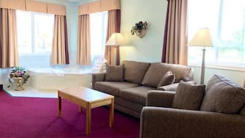 Suite, 1 King Bed, Non Smoking | Living area | LED TV