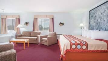 Suite, 1 trĂšs grand lit, non-fumeurs | Coffres-forts dans les chambres, bureau