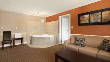 Suite, 1 King Bed | Desk, blackout curtains, iron/ironing board, free cots/infant beds