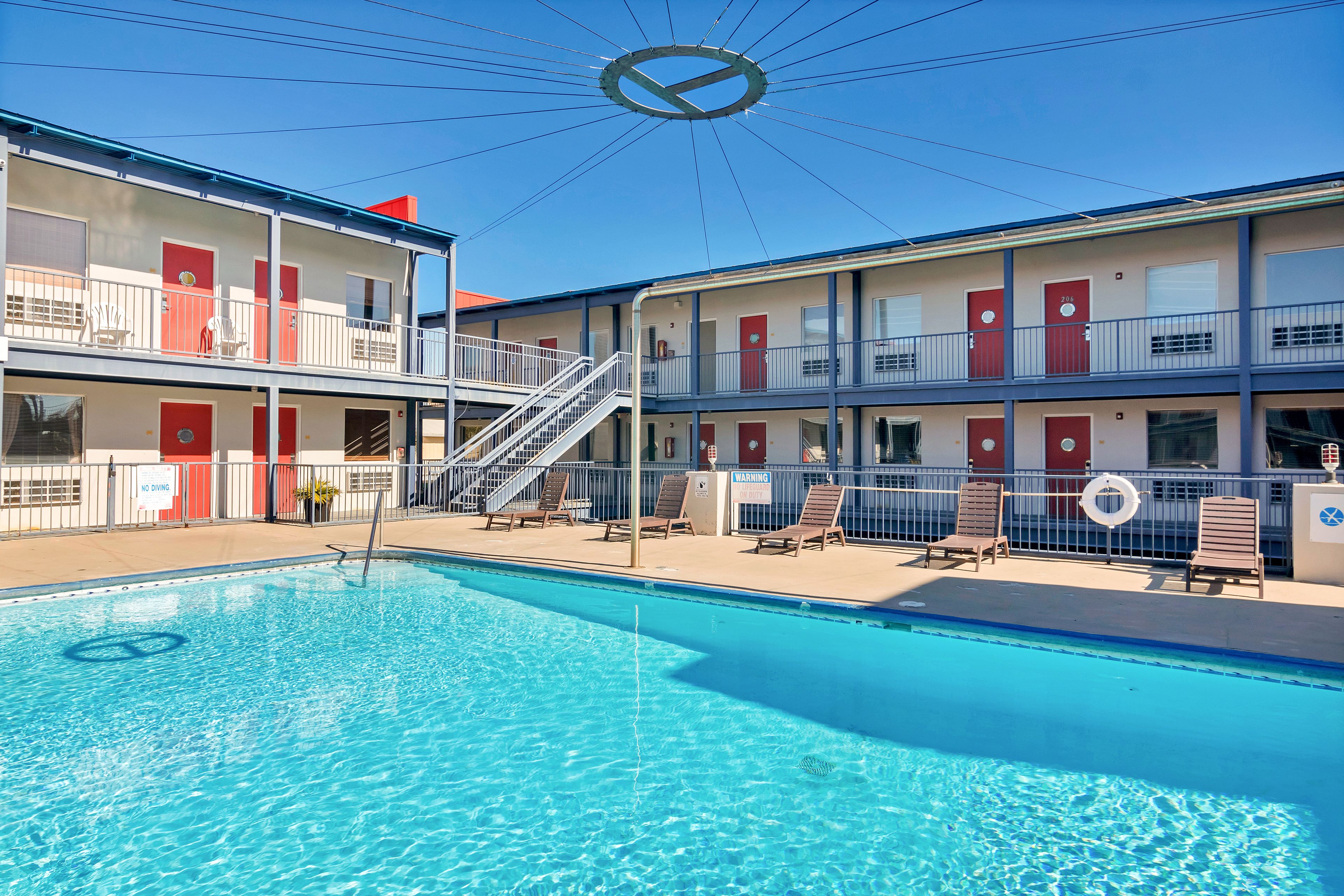 Outdoor pool, pool umbrellas, pool loungers