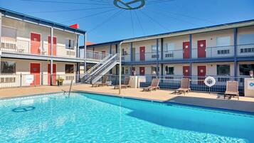 Outdoor pool, pool umbrellas, pool loungers