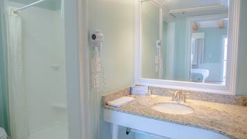 King Size Bed | Bathroom | Combined shower/bathtub, hair dryer, towels