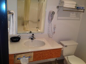 Bathtub, spring water tub, hair dryer, towels