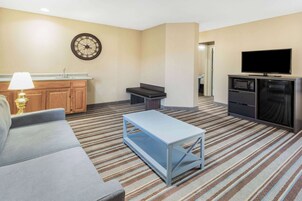 Family Suite, 3 Double Beds, Non-Smoking (Exterior Entrance) | Desk, laptop workspace, blackout drapes, iron/ironing board