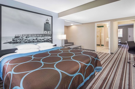 Desk, laptop workspace, blackout drapes, iron/ironing board