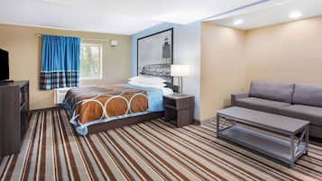 Studio Suite, 1 King Bed, Non Smoking (Exterior Entrance) | Desk, laptop workspace, blackout drapes, iron/ironing board