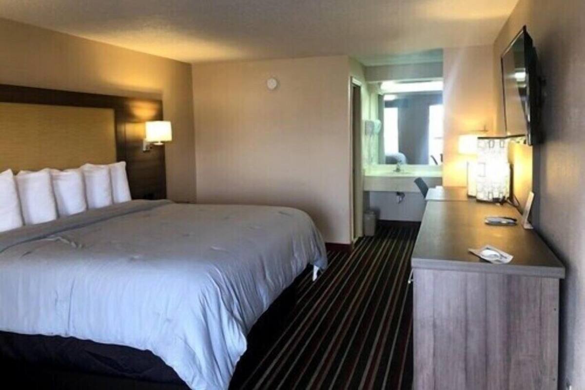 Chambre classique, 1 très grand lit, fumeur | Literie de qualité, couette en duvet, accès au Wi-Fi (inclus)