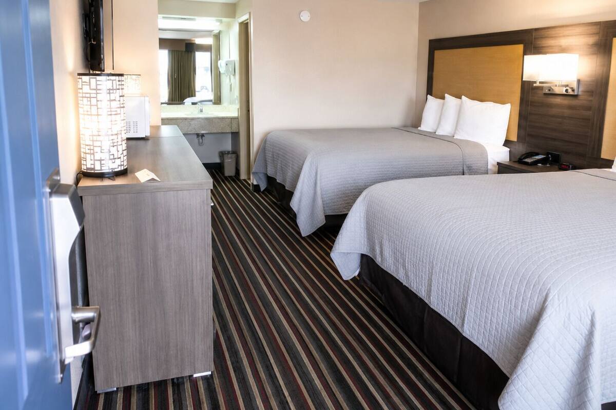 Classic Room, 2 Queen Beds, Smoking | Premium bedding, down comforters, WiFi (free), bed sheets