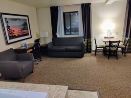 Superior Studio Suite, 1 King Bed, Non Smoking | Living area | 50-inch flat-screen TV with satellite channels, TV