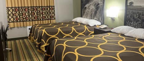 Habitación estándar, 2 camas Queen size | Escritorio, cortinas blackout y tabla de planchar con plancha