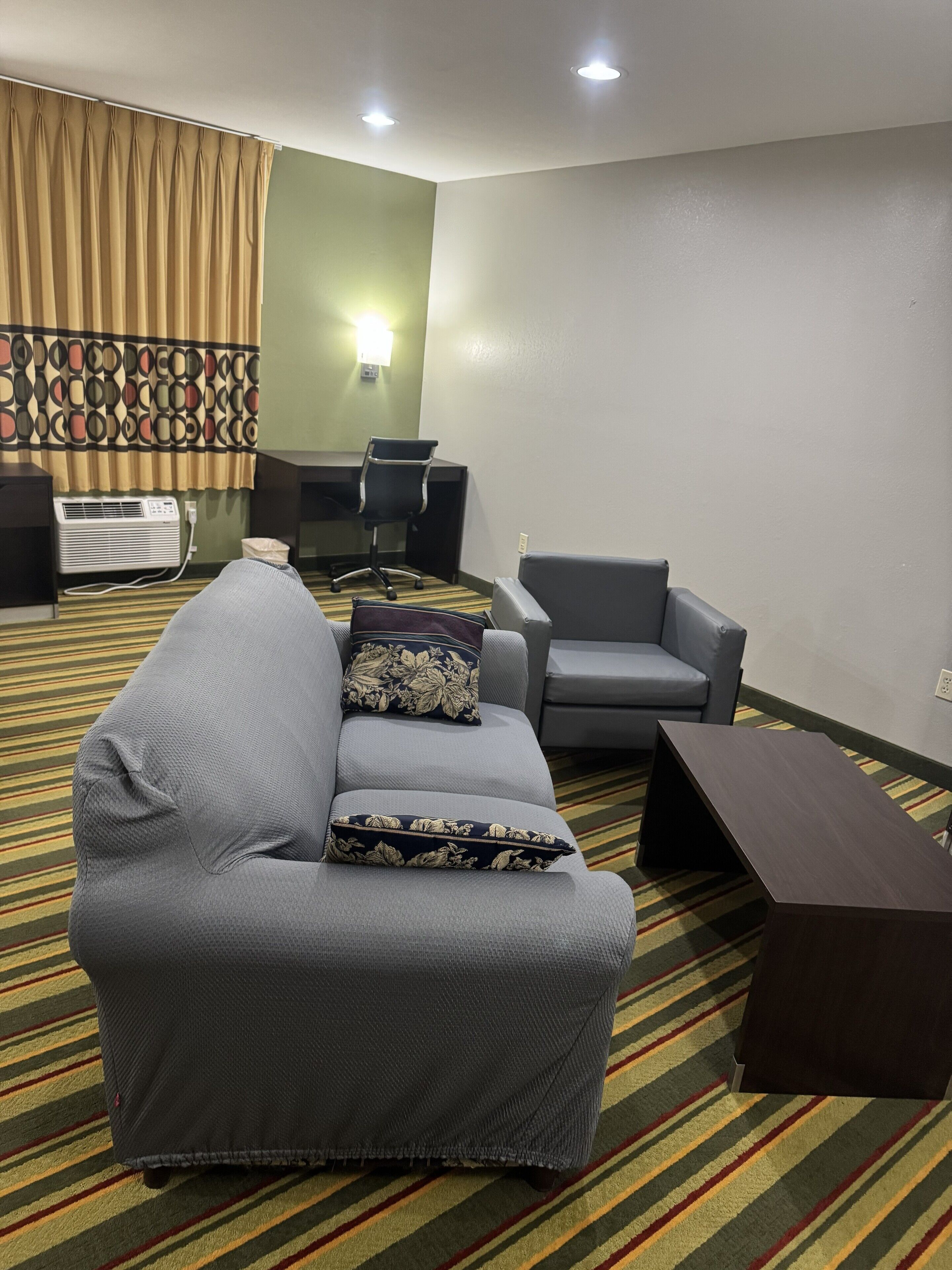 Desk, blackout drapes, iron/ironing board, free cribs/infant beds