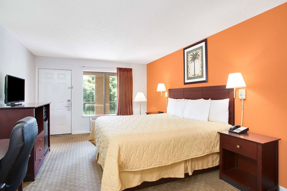 Blackout drapes, iron/ironing board, free cribs/infant beds