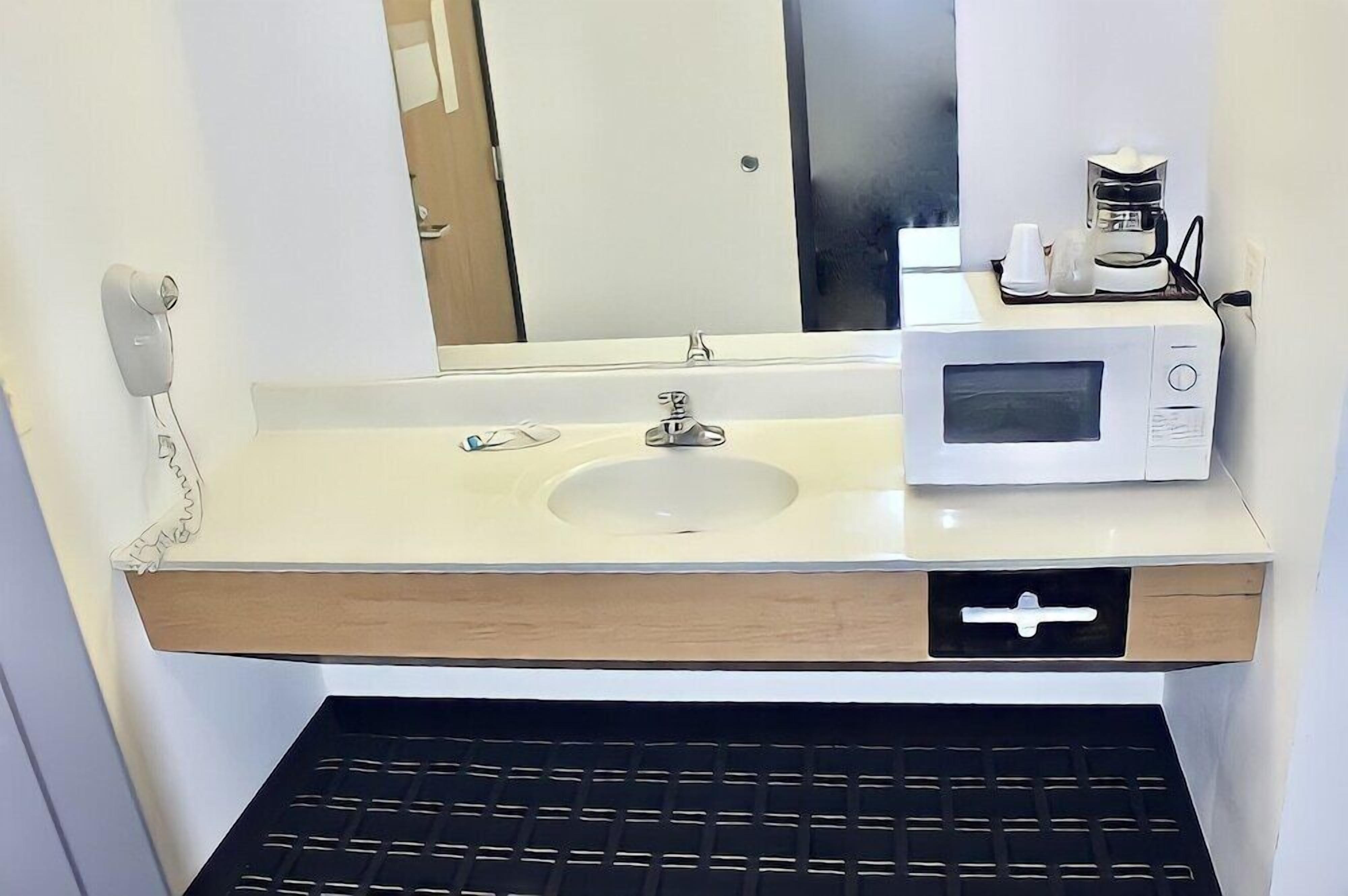 Bathroom | Rainfall showerhead, free toiletries, hair dryer, towels
