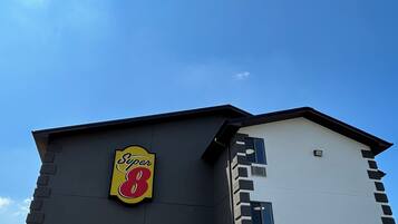 A building with a sign reading 'Super 8' on the side.