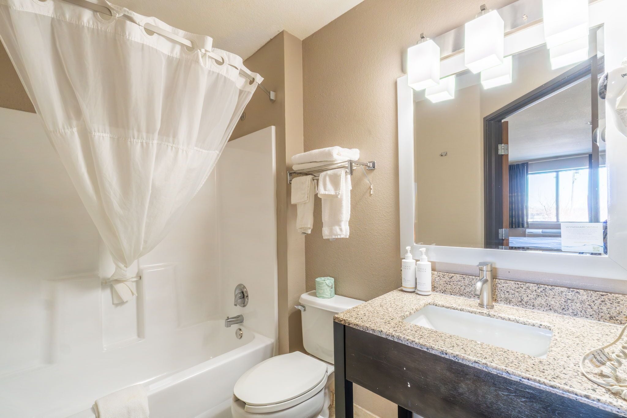 Combined shower/tub, deep soaking tub, rainfall showerhead, hair dryer