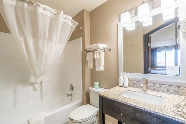 Combined shower/tub, deep soaking tub, rainfall showerhead, hair dryer