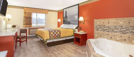 Deluxe Suite, 1 King Bed, Non Smoking | Desk, laptop workspace, blackout drapes, iron/ironing board