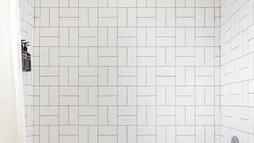 Superior Suite, 1 King Bed (Outpost Family Suite) | Bathroom | Designer toiletries, hair dryer, towels, soap