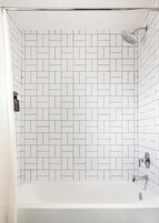 Designer toiletries, hair dryer, towels, soap