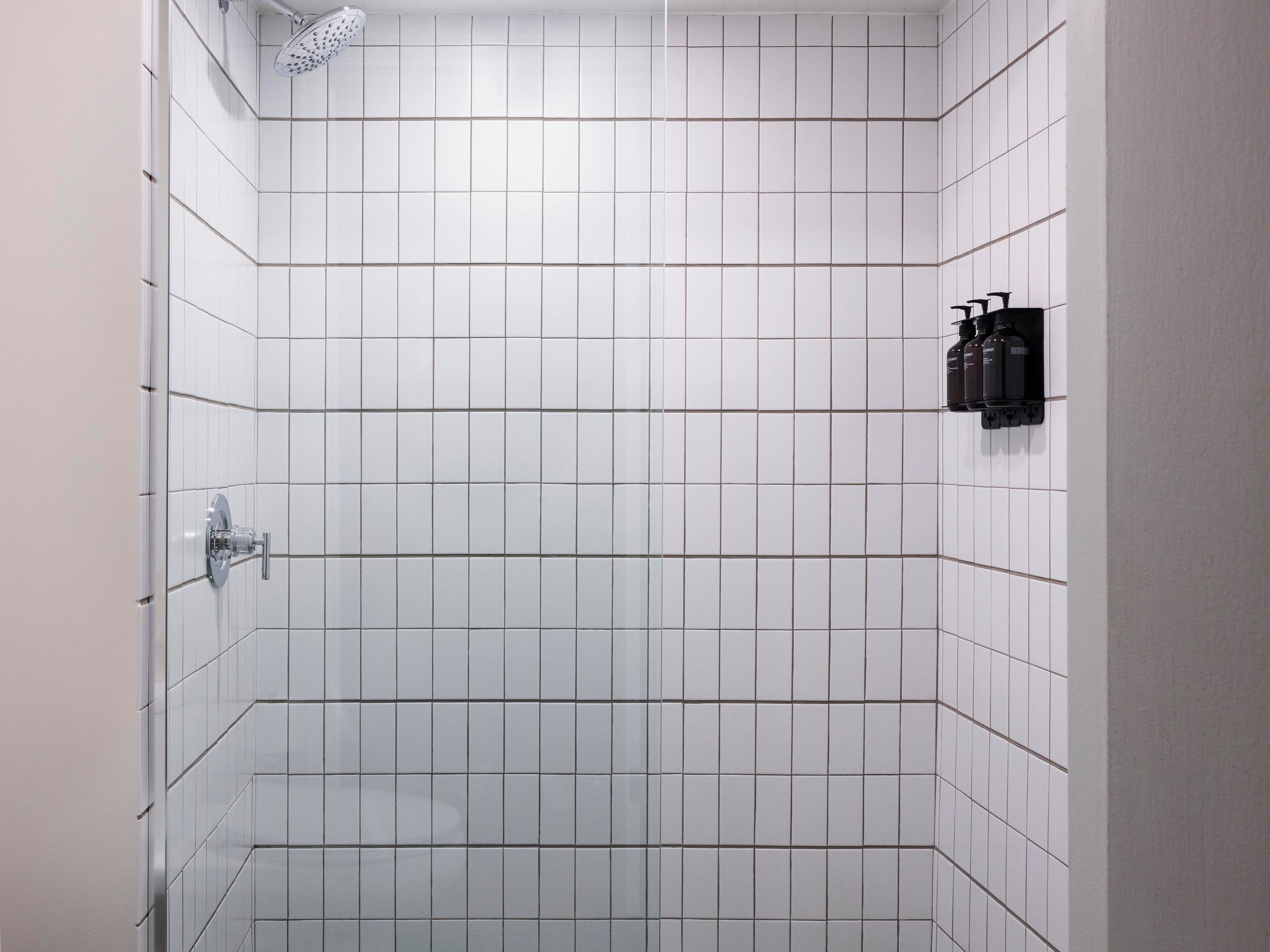 Designer toiletries, hair dryer, towels, soap